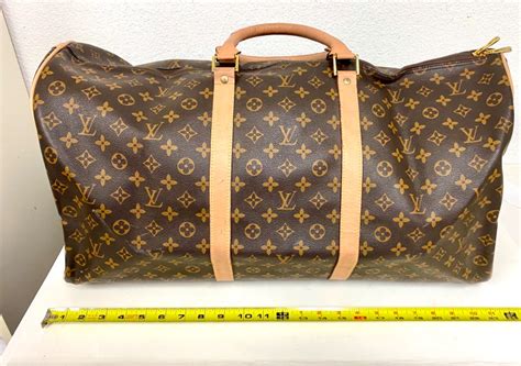 leather duffle bags lv|Lv duffle bag replica.